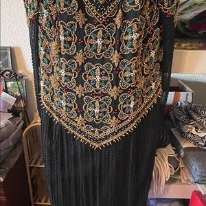 Beaded floor length off the shoulder black gown